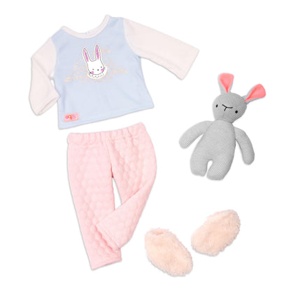 Our Generation 46 cm sleepover doll in pajamas with a soft toy rabbit, perfect for kids ages 3-8.