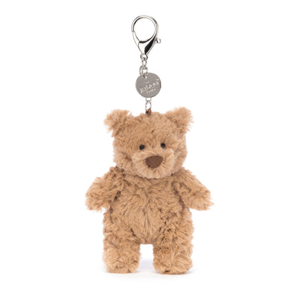 Jellycat Bartholomew Bear bag charm in a cute bear design, measuring 5cm x 6cm x 12cm, perfect for keychains or bags.
