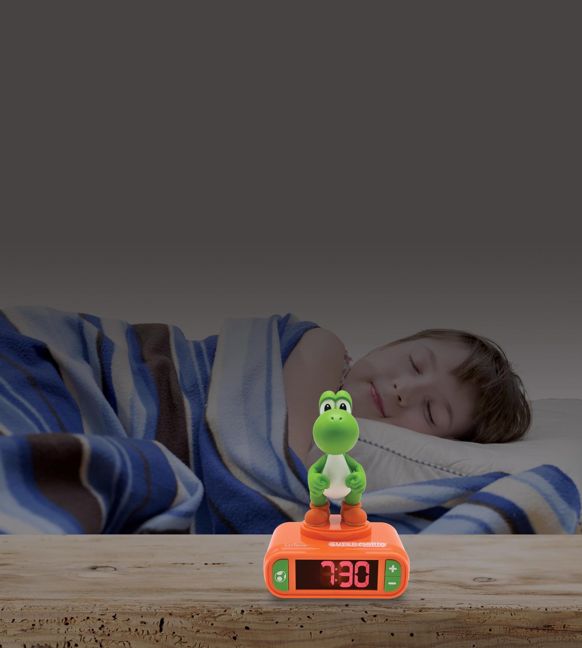 LEXIBOOK Super Mario Yoshi nightlight alarm clock with LCD backlit screen, luminous display, sounds, melodies, and snooze feature in orange.