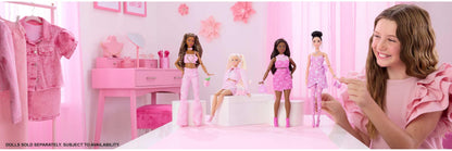 Barbie Deluxe Style Doll #10 in pink denim top and skirt set, featuring black hair and behind-the-ear hearing aids.