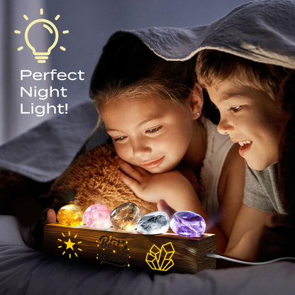 EggBox Gemstone Dig Kit showing a child excavating real gemstones and crystals, with a night light display, educational science toy for kids.