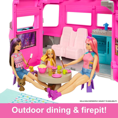Barbie Dream Camper in pink with 7 play areas, 60 accessories, 2 puppies, pool, and slide for imaginative play.