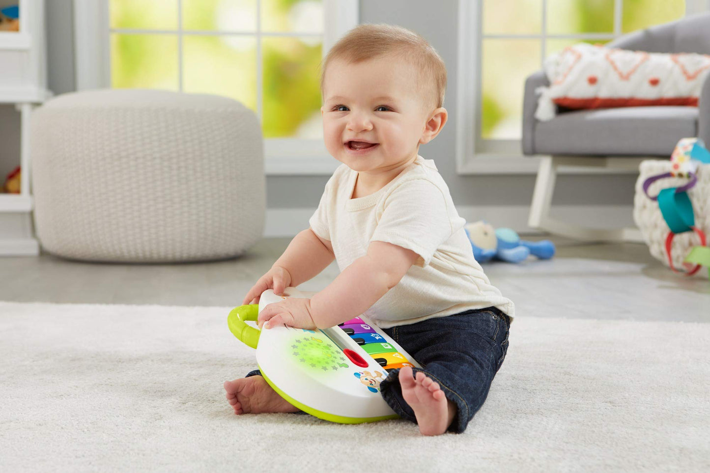 Fisher-Price Silly Sounds Light-Up Piano - UK English Edition, take-along toy piano with lights, real music notes and learning songs for baby and toddlers, GFK04