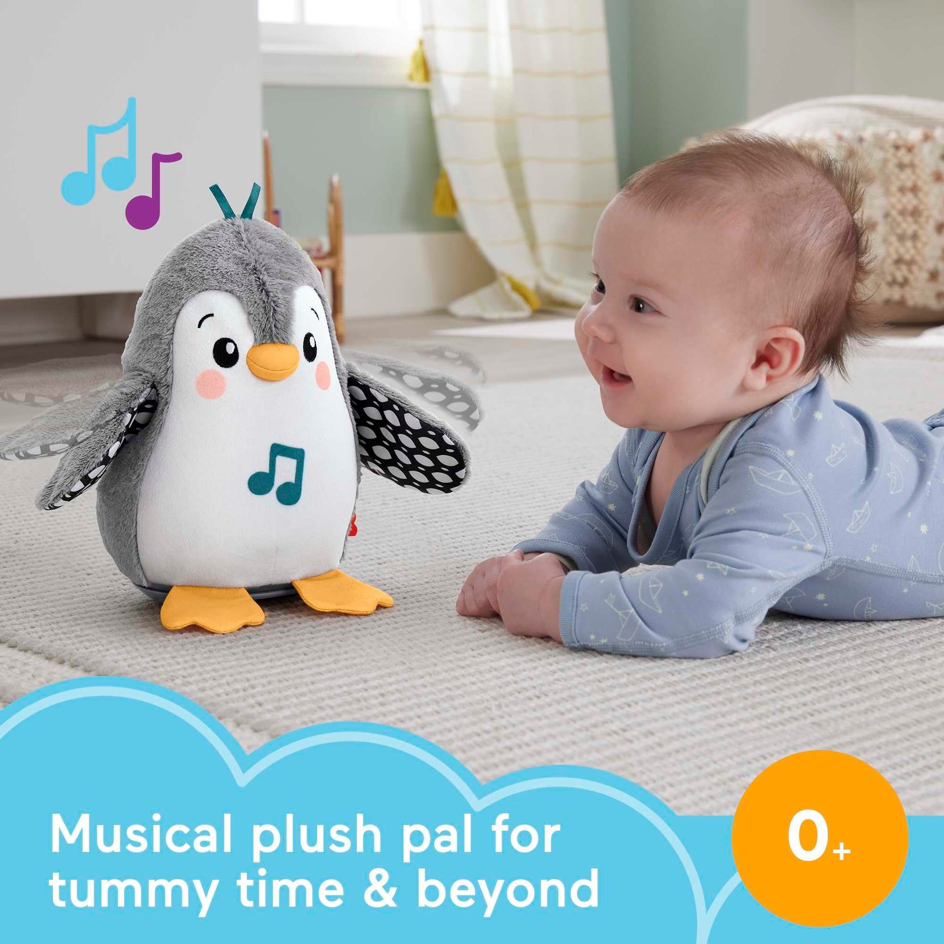 Fisher-Price plush penguin tummy time toy with flaps, wobbling motion, and music for newborns' sensory play and development.
