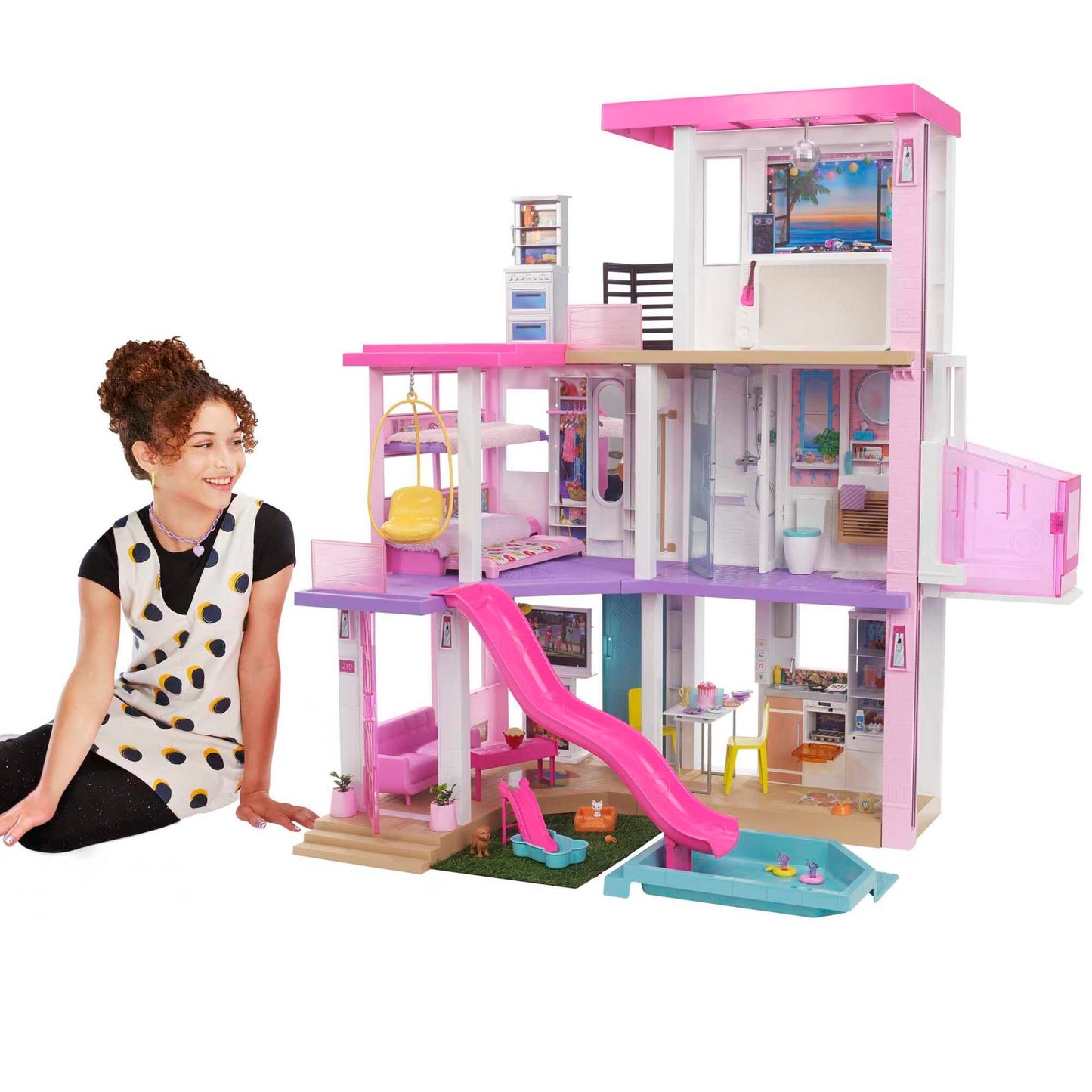 Barbie DreamHouse dollhouse with 75+ accessories, wheelchair elevator, 10 play areas, customizable lights, and music features.