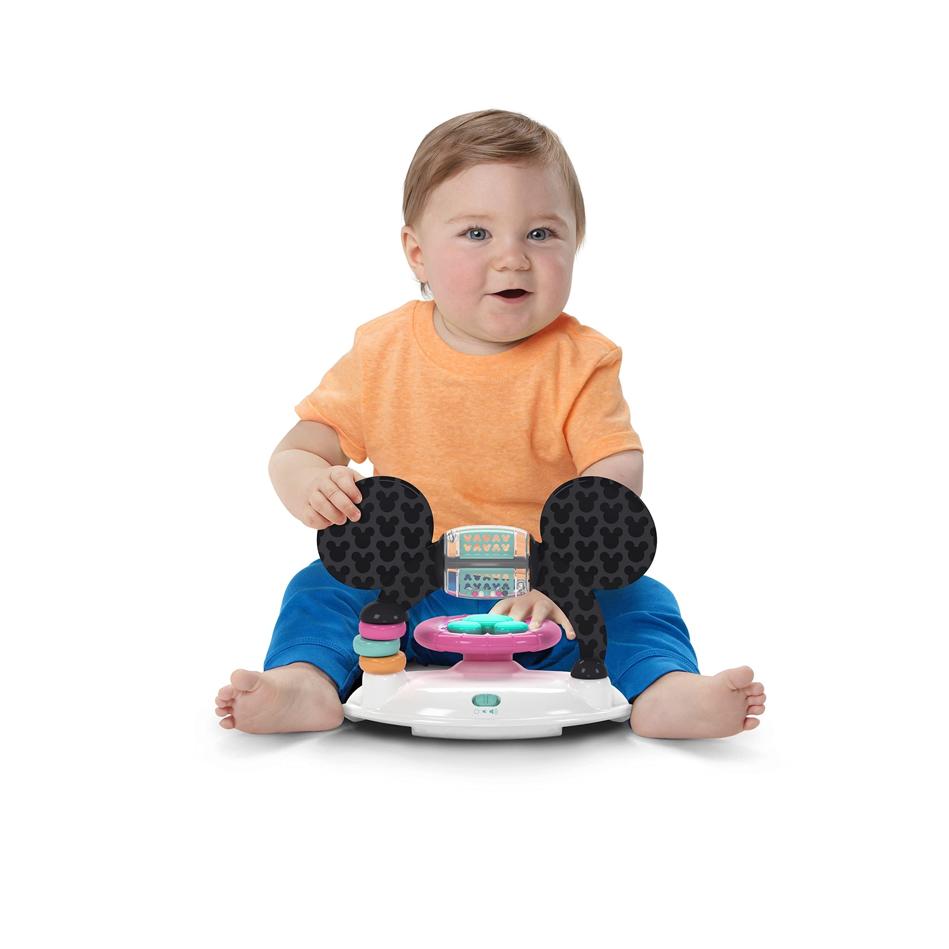 Bright Starts Disney Baby Minnie Mouse 2-in-1 activity walker with removable toy station, lights, sounds, adjustable height in pink.