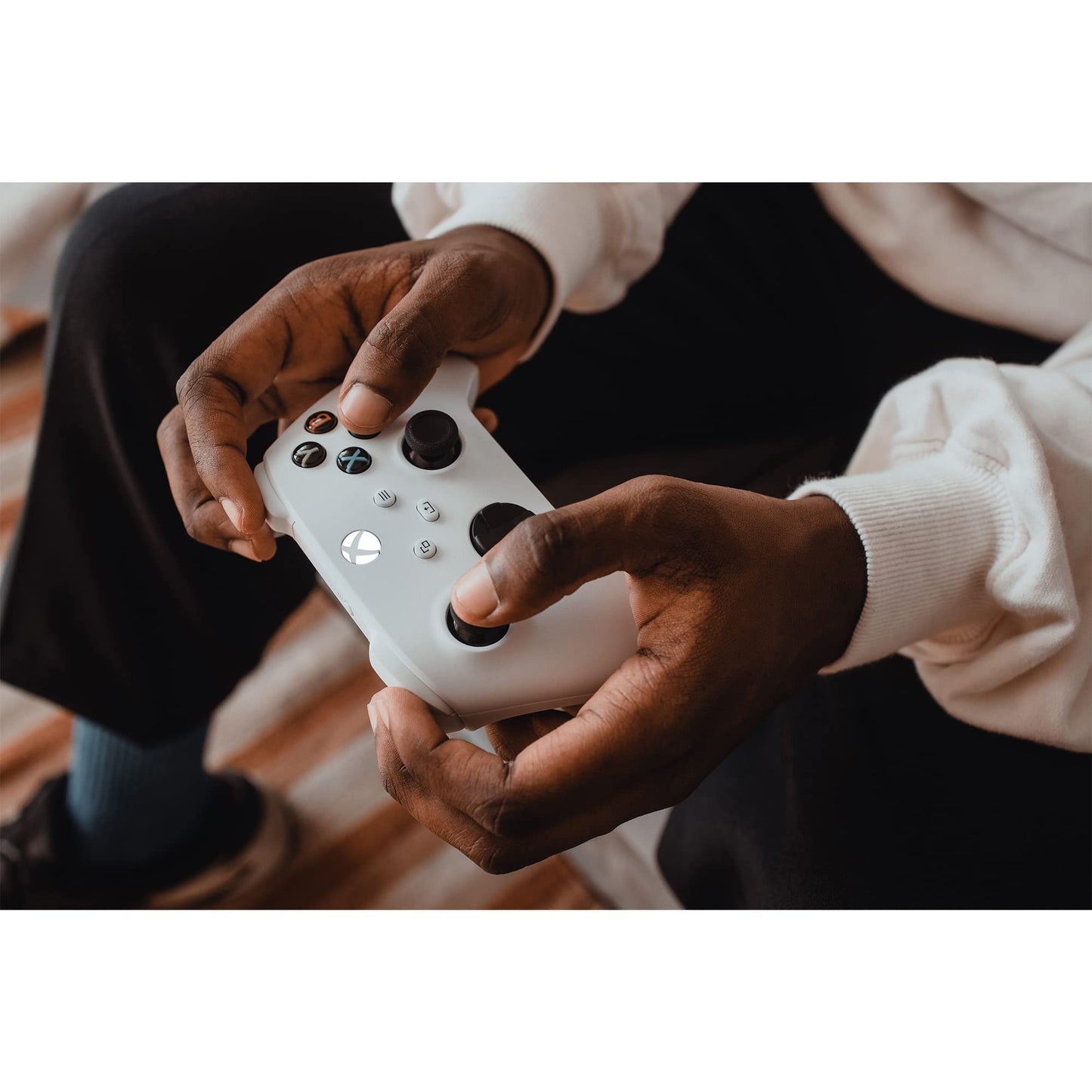 Xbox Wireless Controller in Robot White for Xbox Series X|S, One, and Windows devices, featuring ergonomic design and textured grips.
