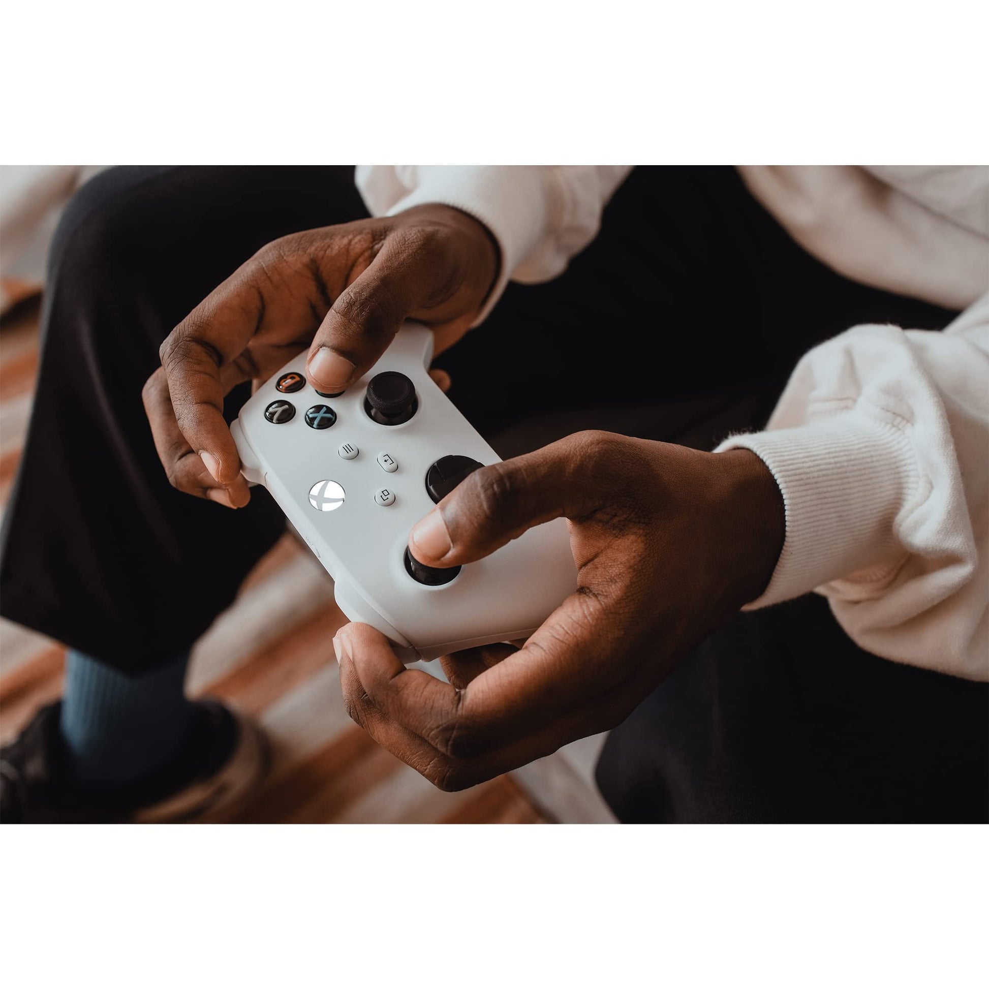 Xbox Wireless Controller in Robot White for Xbox Series X|S, One, and Windows devices, featuring ergonomic design and textured grips.