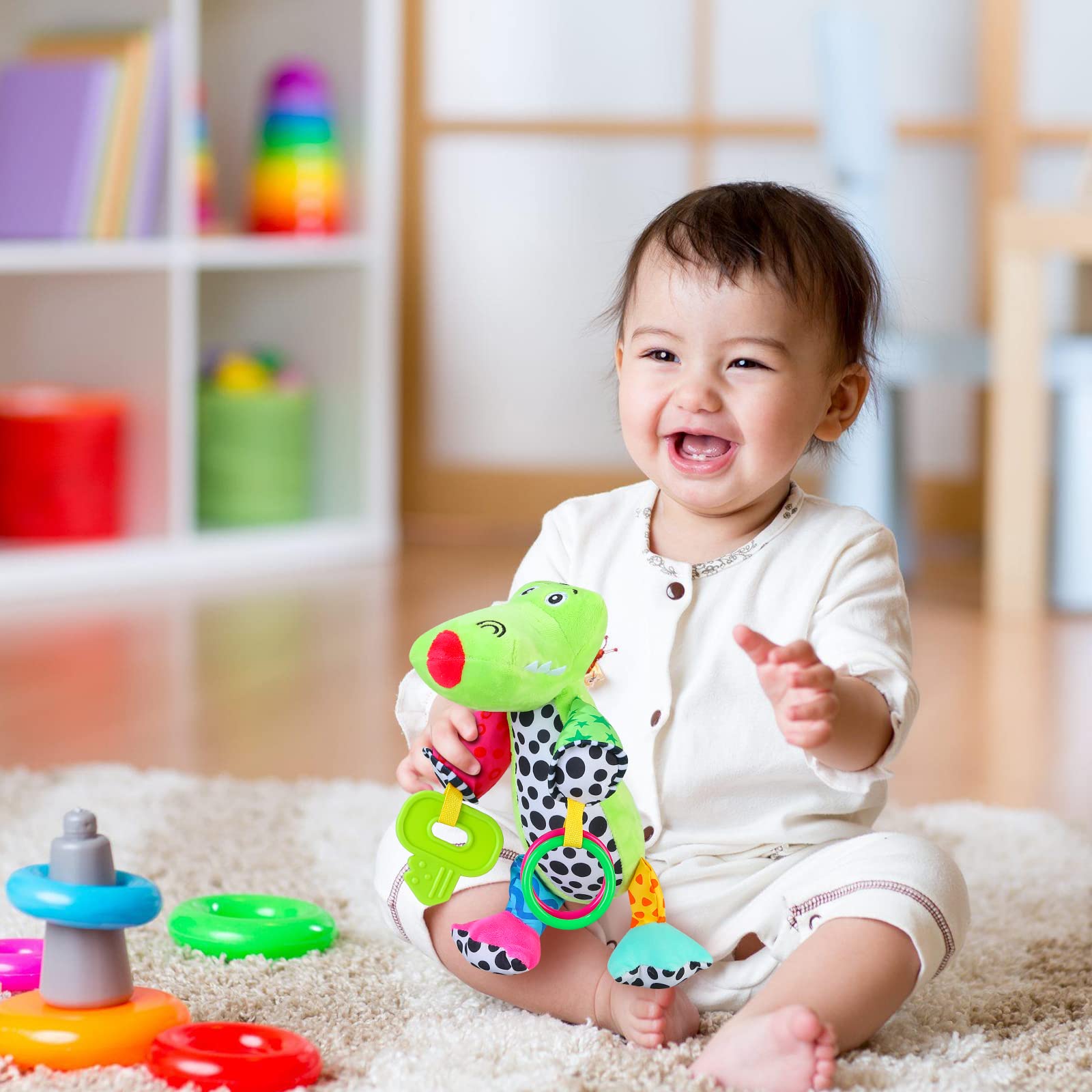 MEERO LONDON crocodile clip sensory teether toy for newborn babies on pram or pushchair, suitable for boys and girls.