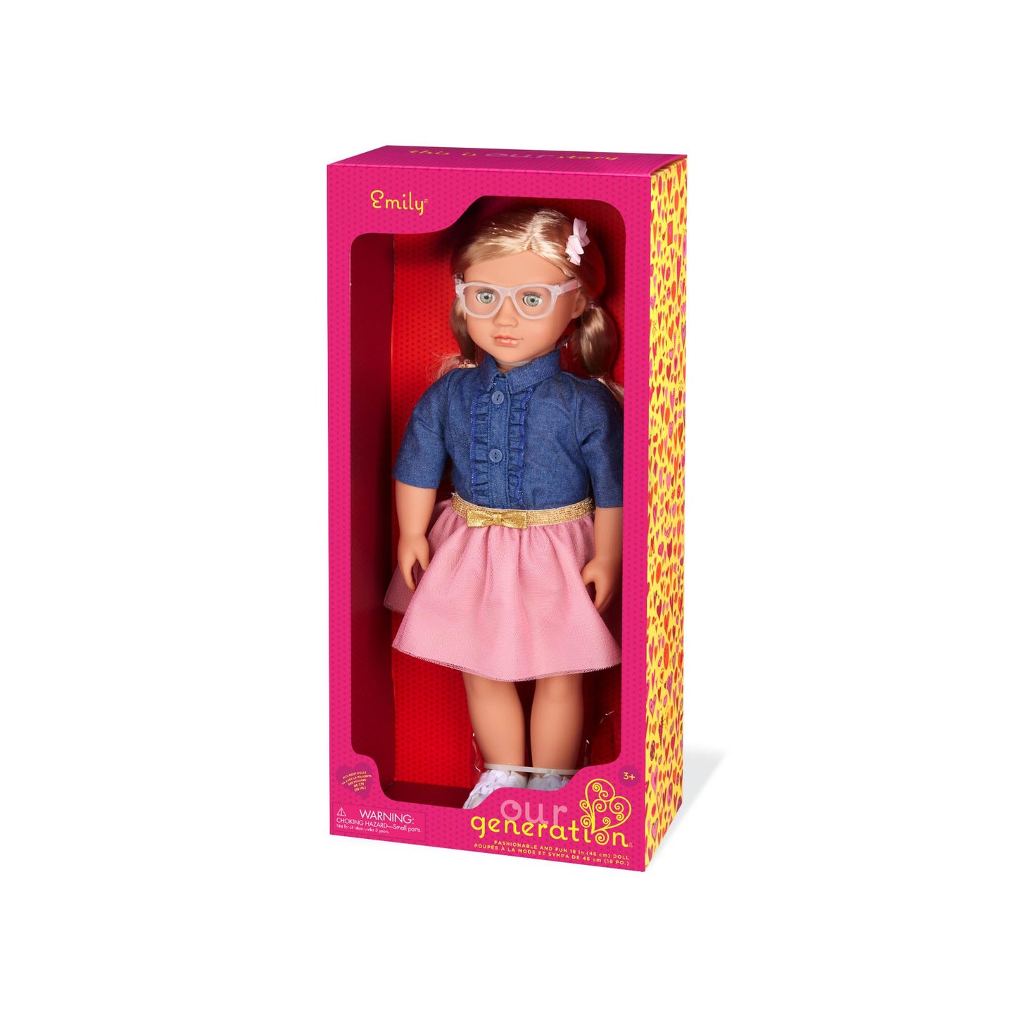 18-inch Our Generation Emily doll in pink dress and denim top, wearing stylish glasses, with a soft huggable body.
