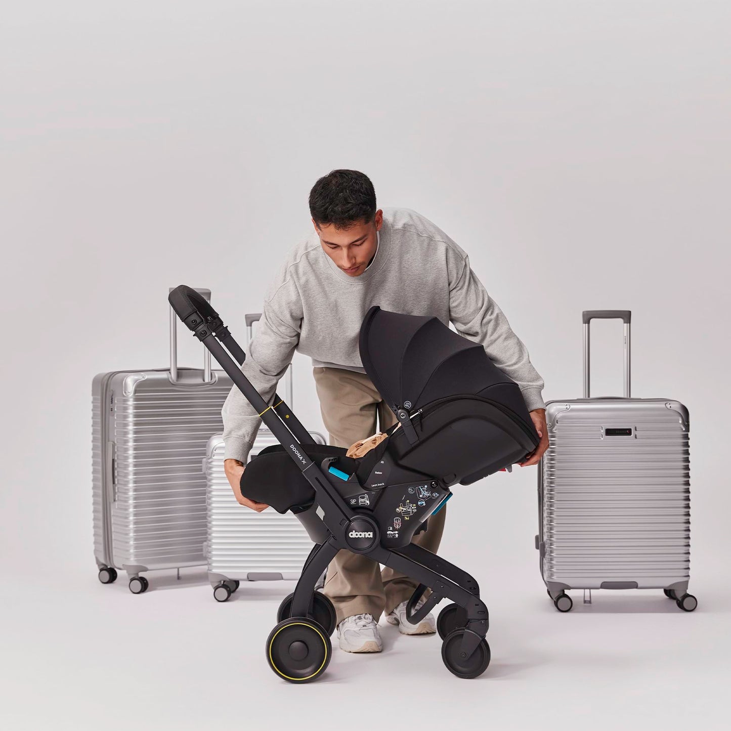 Doona X Baby Car Seat & Travel Stroller Nitro Black - Convertible 0+ Car Seat and Pram with 3 Recline Positions - Ergonomic Pushchair and Travel System - ISOFIX Base Sold Separately