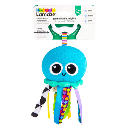 LAMAZE Mini Clip & Go Sprinkles Jellyfish sensory toy attached to a baby’s pram, colorful clip-on plush toy for newborns 0-6 months.