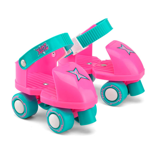 Xootz kids adjustable quad roller skates for girls and boys, with blue and pink design, suitable for indoor and outdoor skating.