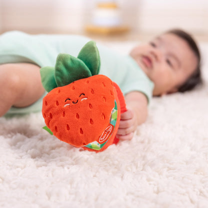 Melissa & Doug multi-sensory peek-a-boo berry infant travel toy with colorful clips and soft textures for babies up to 12 months.