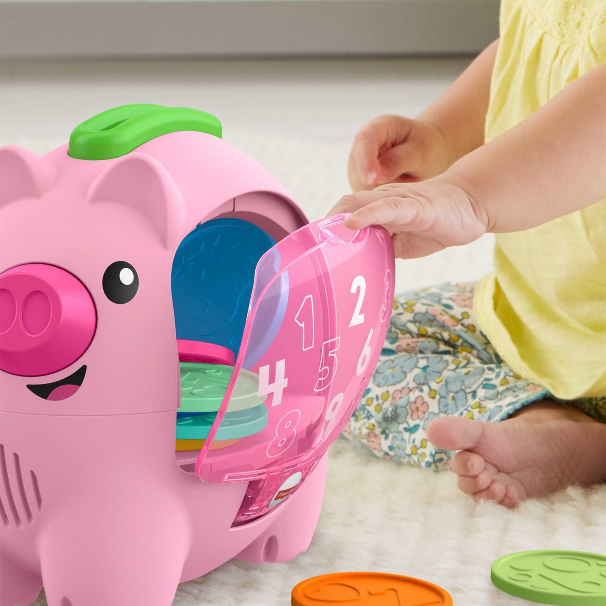 Fisher-Price Laugh & Learn Count & Rumble Piggy Bank musical baby toy with colorful design and fun motion features