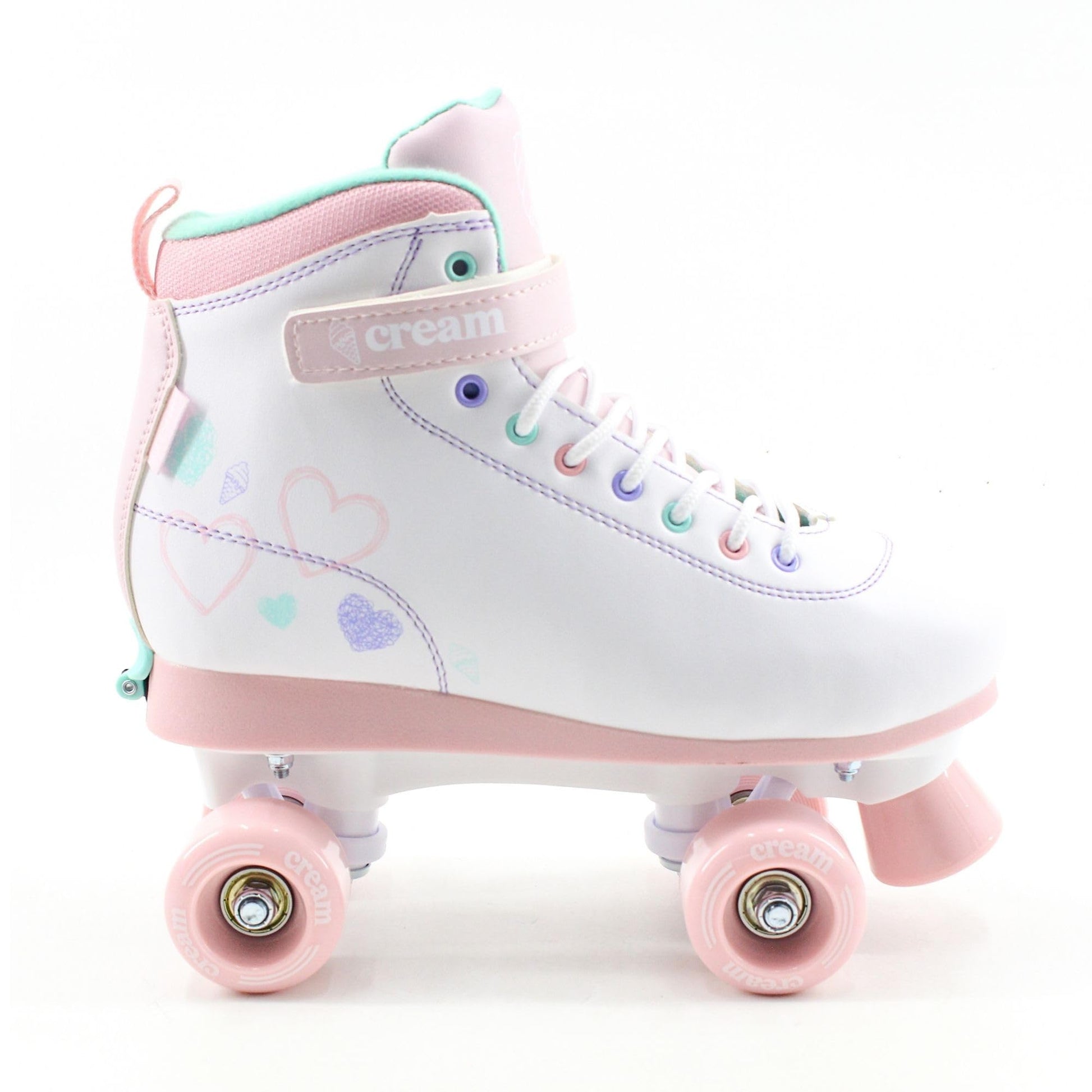 Cream Scoop Kids adjustable quad roller skates with white and pink hearts, featuring four wheels for stability and extended fit for beginners.