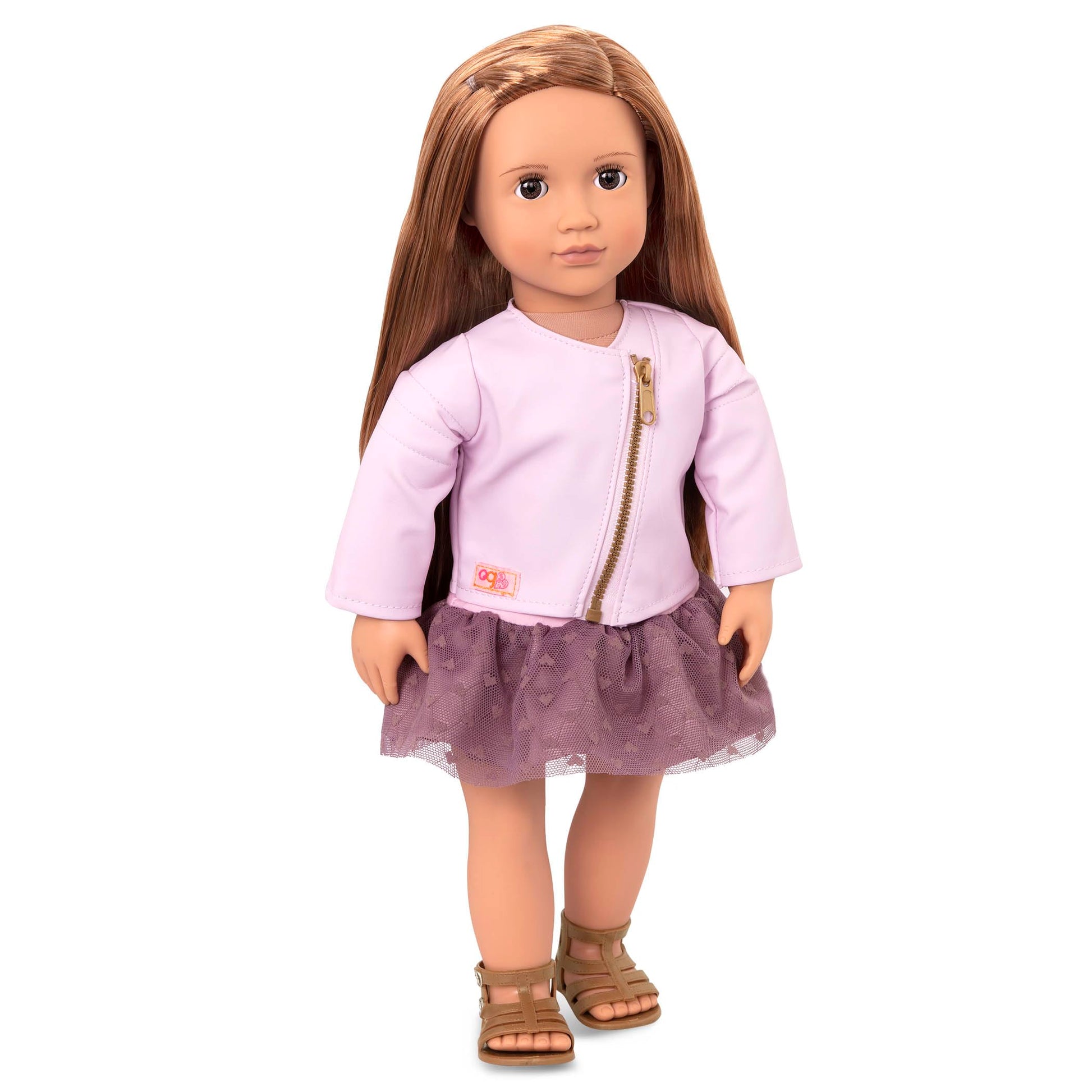 Our Generation Vienna fashion doll wearing a sleeveless dress, pink faux-leather jacket, undies, and purple-pink sandals.