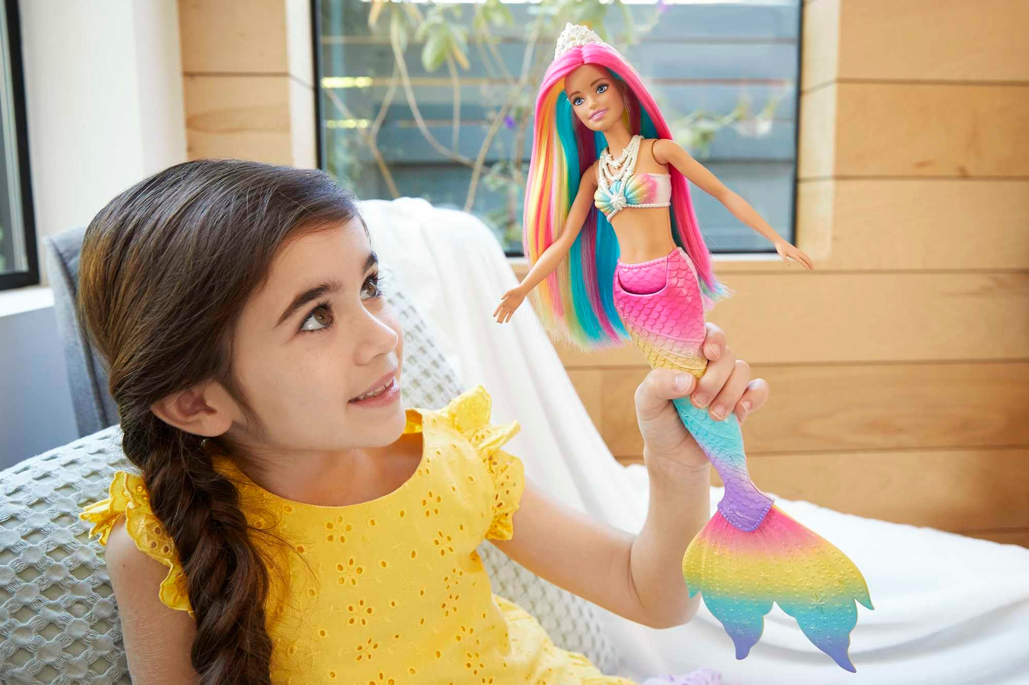 Barbie Dreamtopia Mermaid Doll with rainbow hair and color change feature, perfect for imaginative play for ages 3 to 7.