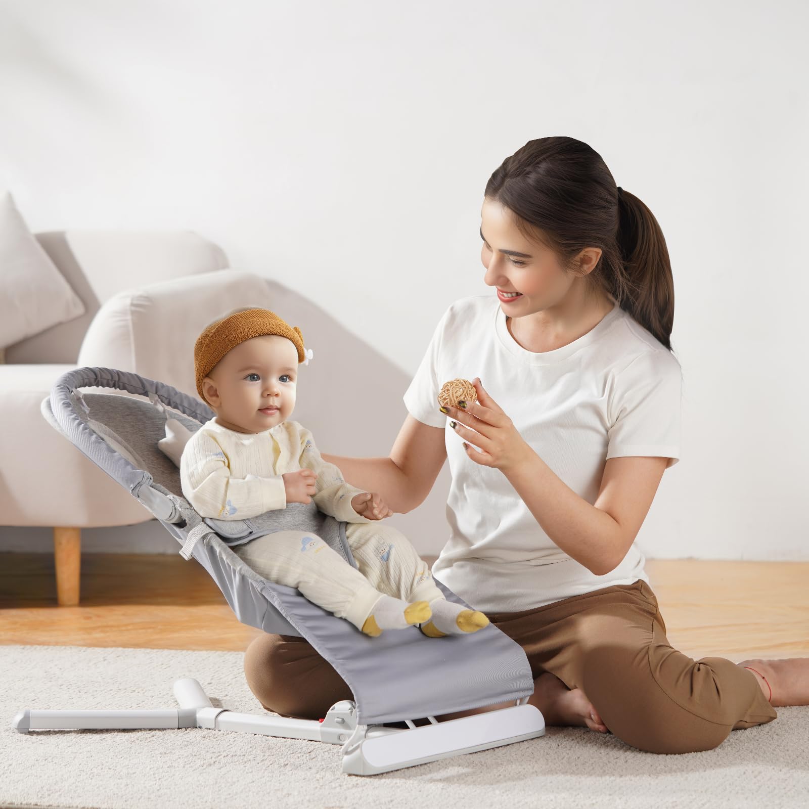 VEVOR baby bouncer seat for infants 0-9 months, folding design with reclining angles, toy bar, and portable travel bag.