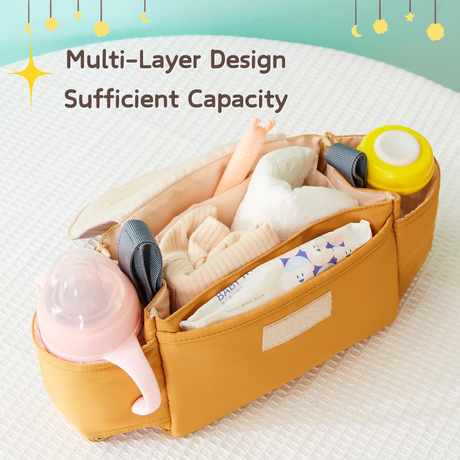 HAGOT baby pushchair organiser with cup holder and mummy bag, universal fit for all buggy models, shown attached to a stroller.