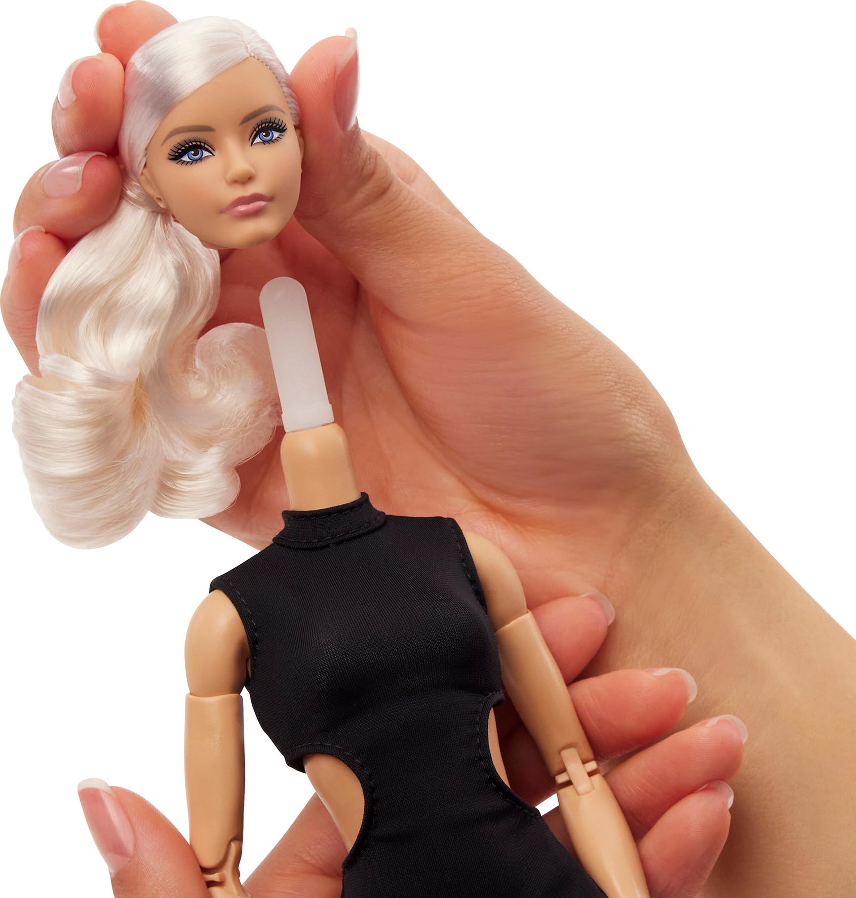 Barbie Mattel Basics Model 02 collector doll with blonde hair, black mini dress, gladiator boots, and posable body.