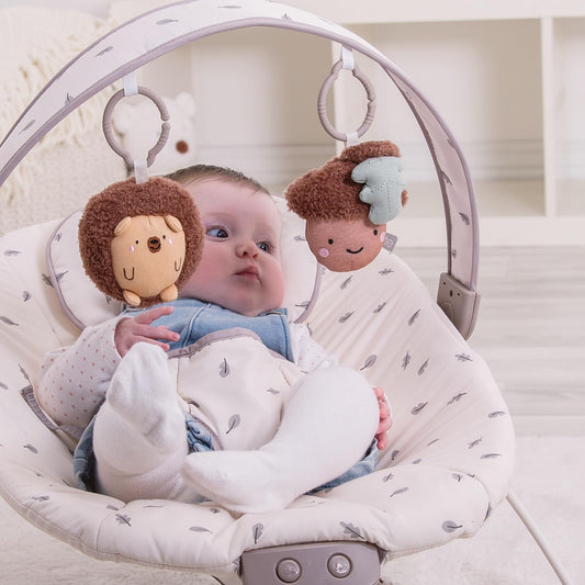 Red Kite Cozy Bounce musical baby bouncer featuring woodland walk design with soft padding and adjustable safety harness.