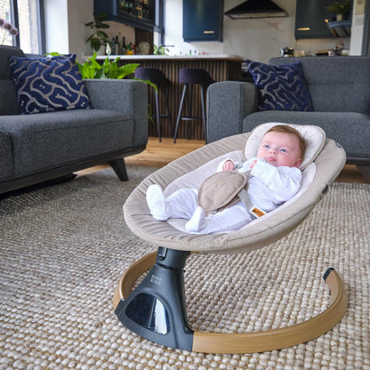 Baba Bing beige electric baby swing chair with Bluetooth, digital display, lightweight design, and five swinging options for infants.
