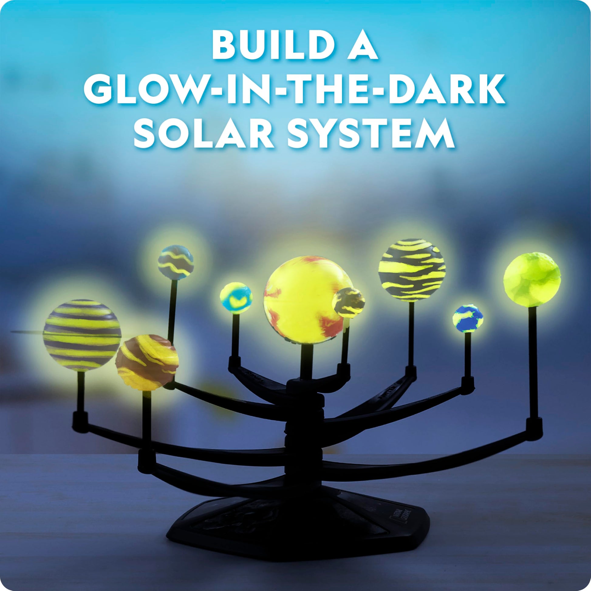 Blue Marble National Geographic glow-in-the-dark solar system model kit for kids, featuring 3D planets with movable arms.