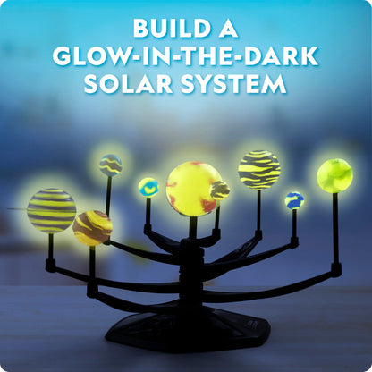 Blue Marble National Geographic glow-in-the-dark solar system model kit for kids, featuring 3D planets with movable arms.
