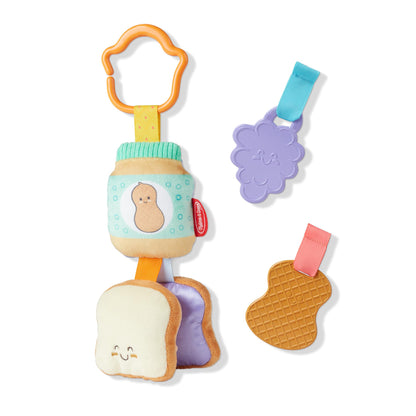 Melissa & Doug multi-sensory PB&J take-along clip-on baby toy with colorful fruit shapes for infants and toddlers.