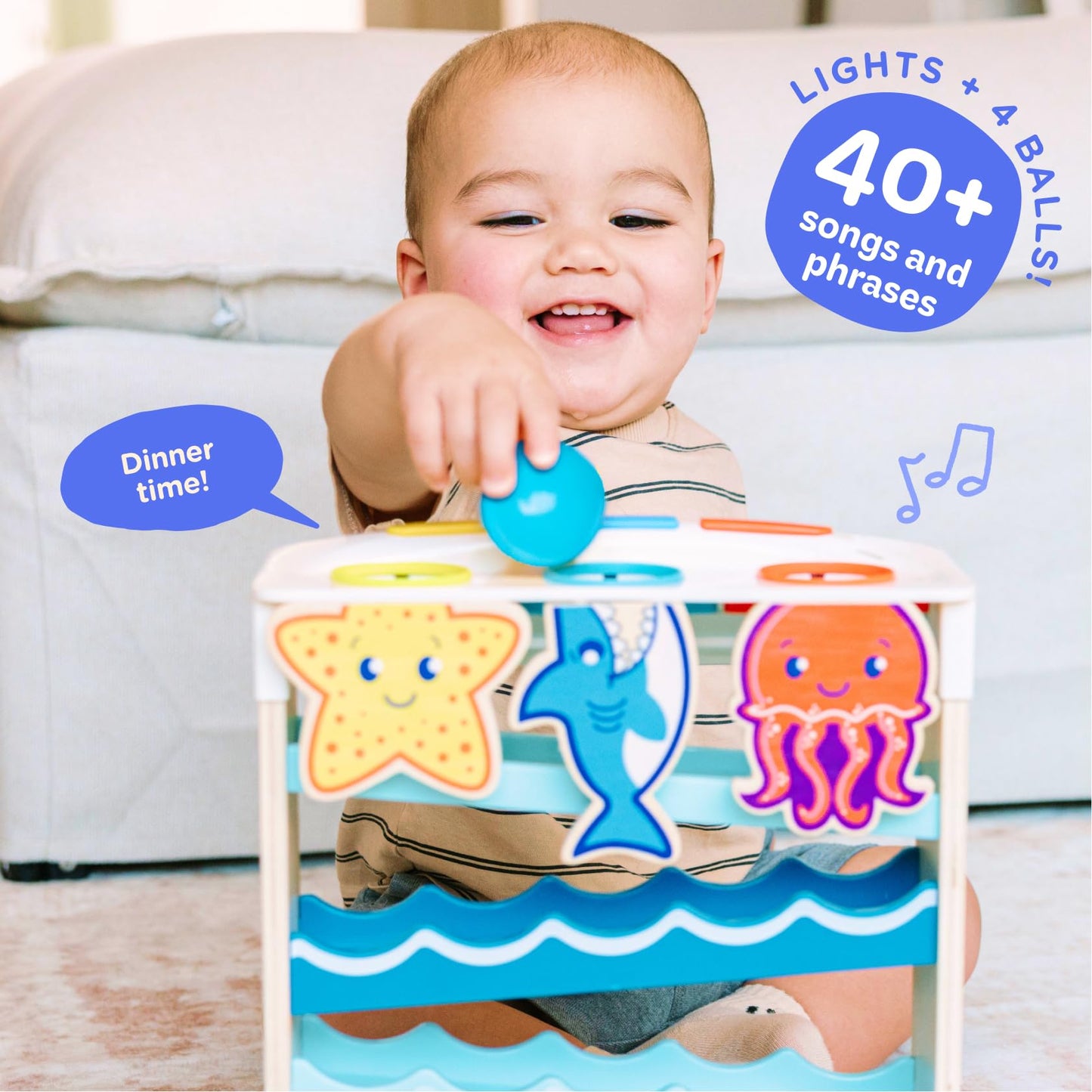 Wooden Ocean Friends interactive toy from Move2Play for babies 6-12 months, featuring colorful ocean animal designs.