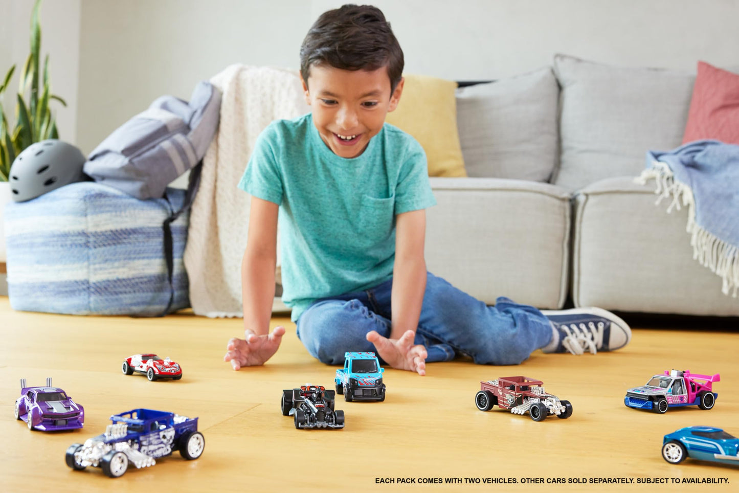 Set of 2 Hot Wheels pull-back speeders in assorted styles, showcasing detailed designs and movable parts in 1:43 scale.