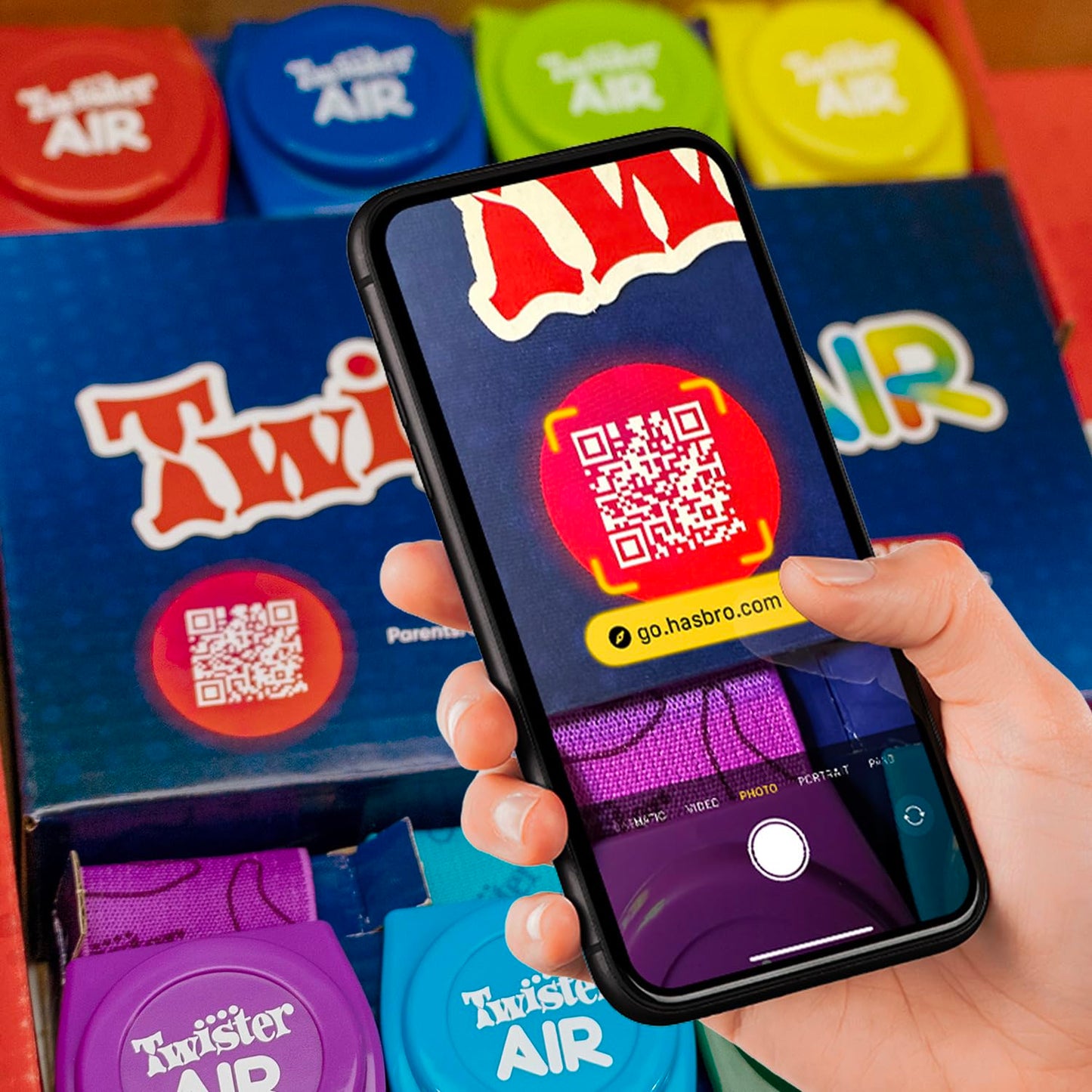 Hasbro Gaming Twister Air Party Game Includes 4 Twister Air Wrist Bands, 4 Twister Air Ankle Bands, Device Stand with clip, base, and post, and Game Rules For Ages 8+ Years