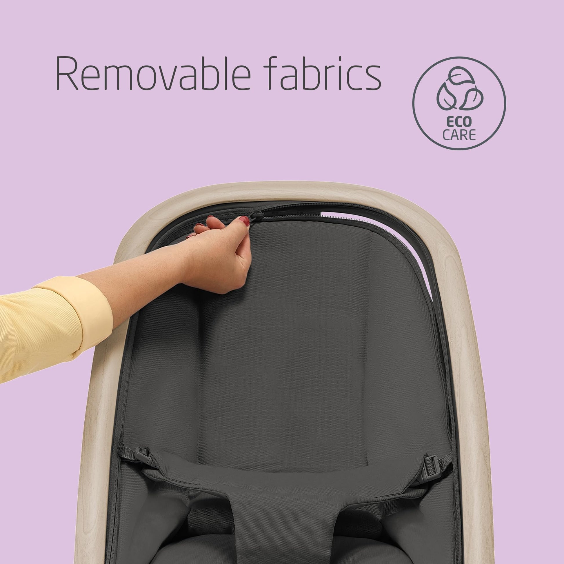 Maxi-Cosi Kori 2-in-1 ergonomic baby bouncer chair with toy arch, adjustable recline, lightweight design, and newborn pillow in Beyond Graphite.