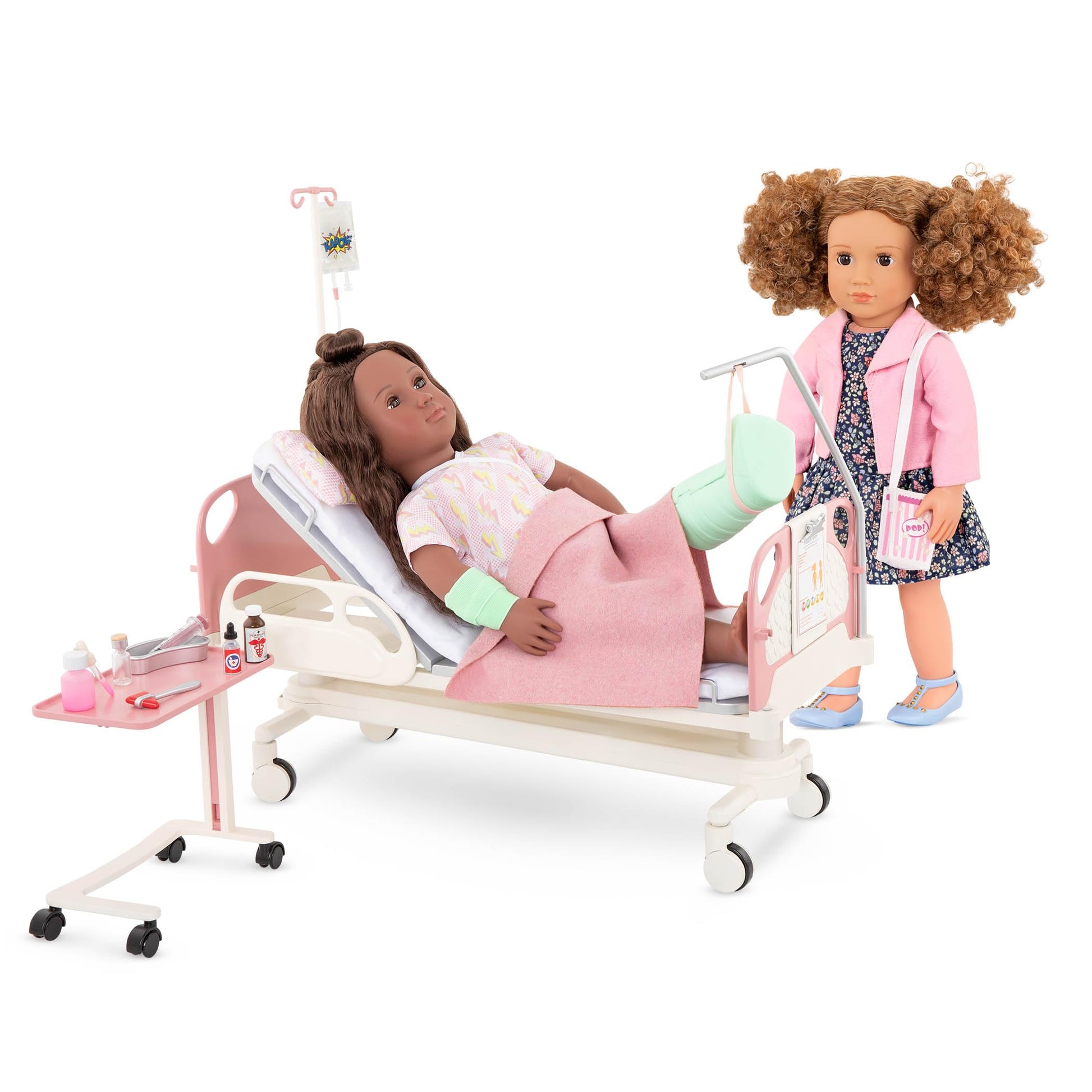 Our Generation doll hospital bed set with gown, stethoscope, and medical kit for 18-inch dolls and kids ages 3 and up.