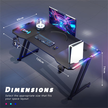 DLONGONE Gaming Desk with LED Lights, 120 x 60 cm Gaming Table Z Shaped, Gamer Desk with Carbon Fiber Coated, Gaming PC Table with Headphone Hook and Cup Holder, Computer Desks Easy to Assemble, Black