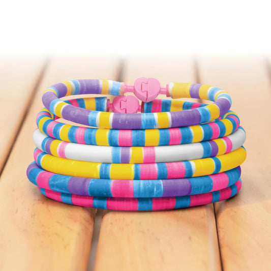 FabLab Colour Spin Bracelet Maker kit showing colorful bracelets created with the no-threading jewelry making set for kids.