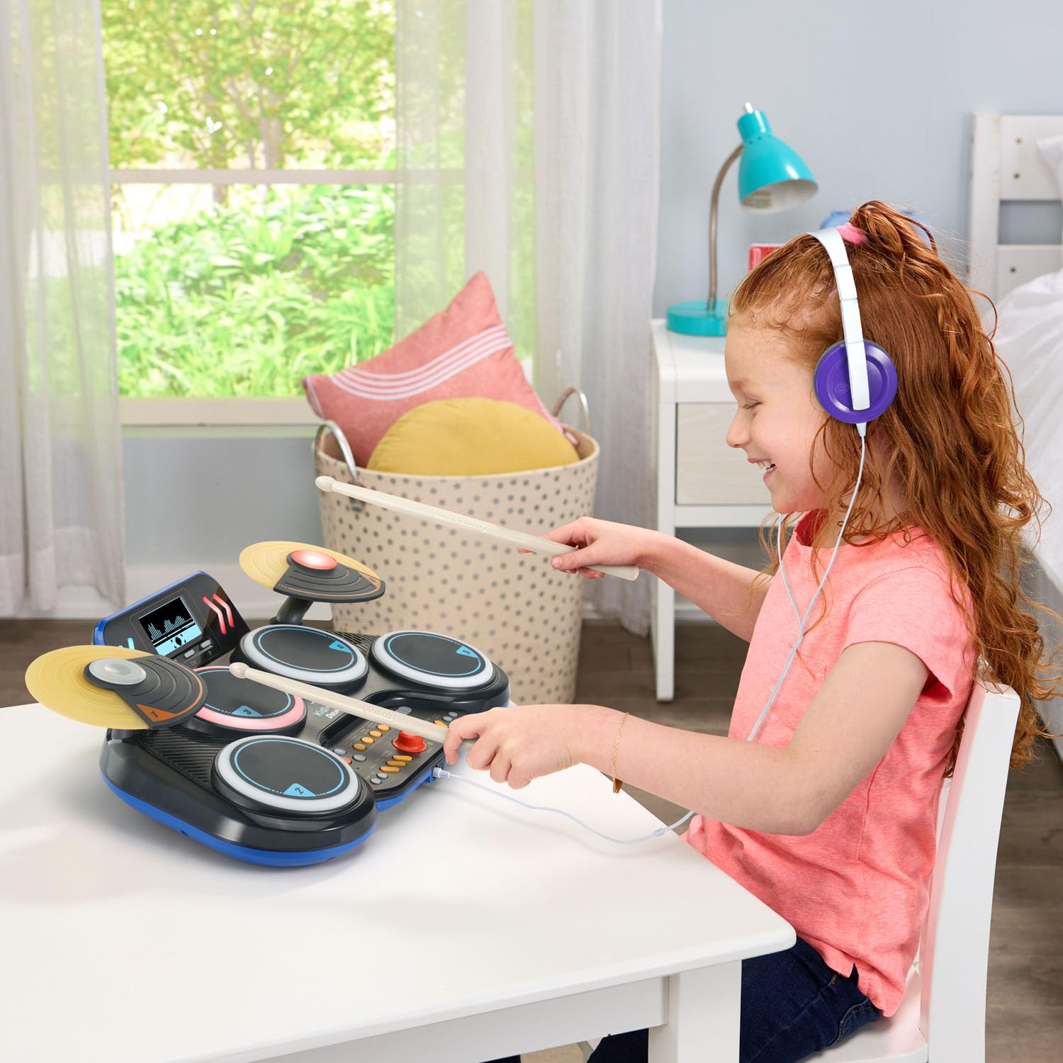 VTech Kidi Star Black Drum Pad with colorful buttons and drumsticks for kids' musical play and rhythm practice.