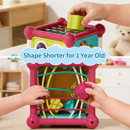 Colorful baby activity cube by Imagibox with shape sorter, music, pop-up bubbles, and sensory features for early learning ages 6-12 months.
