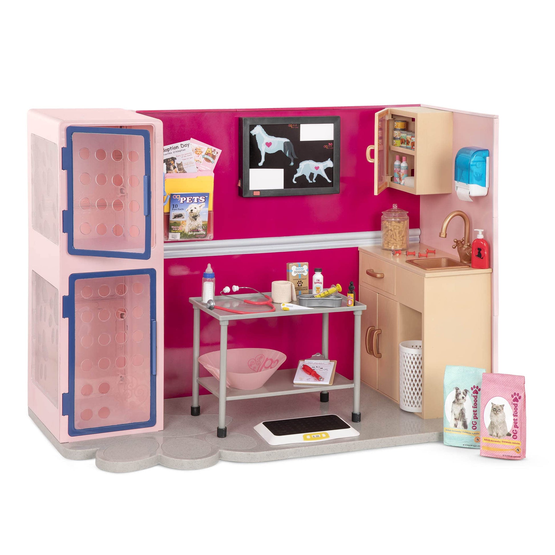 Our Generation Healthy Paws Vet Clinic playset with pink accessories for 18-inch fashion dolls, featuring veterinary tools.