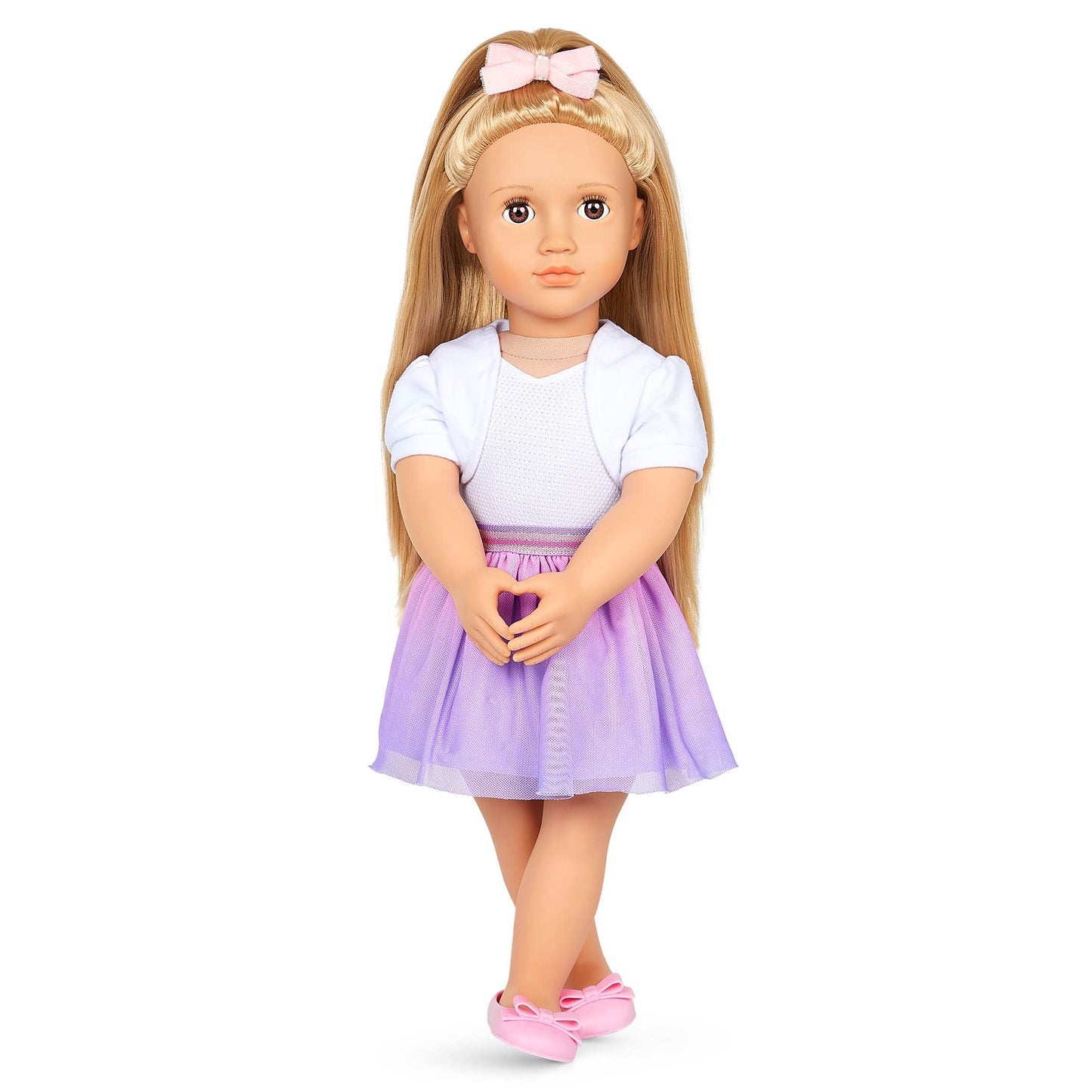 Our Generation Thea doll with blonde hair and hazel eyes, featuring bow-themed outfits and styling accessories in a gift box.