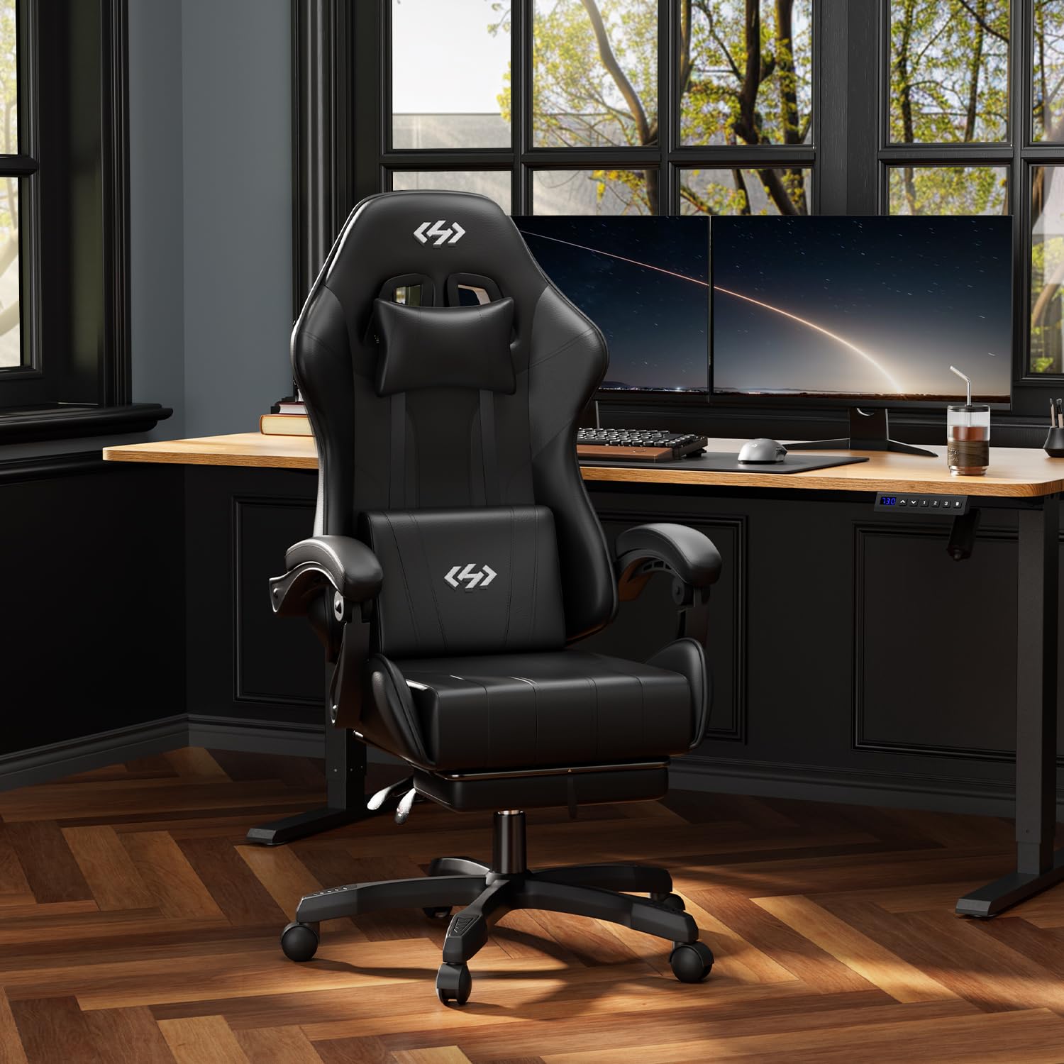 Black Precision Synergie gaming chair with ergonomic design, adjustable height, lumbar support, headrest, footrest, and 360° swivel.