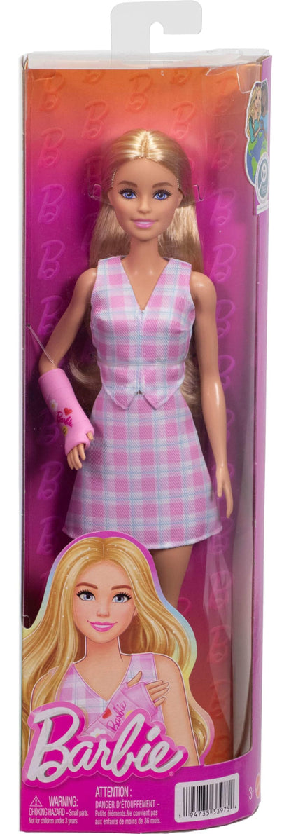 Barbie Fashionistas Doll #243 with blonde hair, plaid outfit, pink arm cast, and pink loafers.