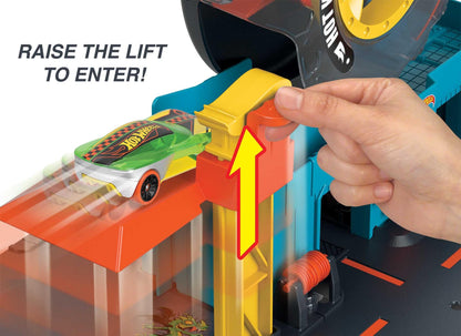 Hot Wheels City Super Twist Tire Shop Playset with spinning key and included Hot Wheels car for kids aged 4 to 8.