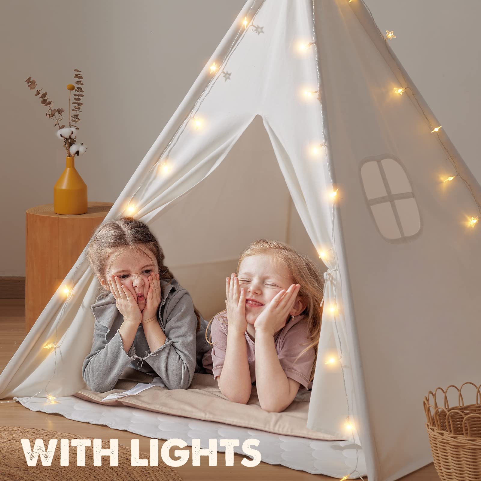 Tiny Land kids teepee tent in raw white canvas with padded mat, light string, and carry case, ideal for indoor and outdoor play.