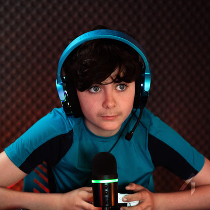 STEALTH PANTHER gaming headset in Plasma Blue with over-ear design, adjustable headband, and integrated microphone for immersive gaming.