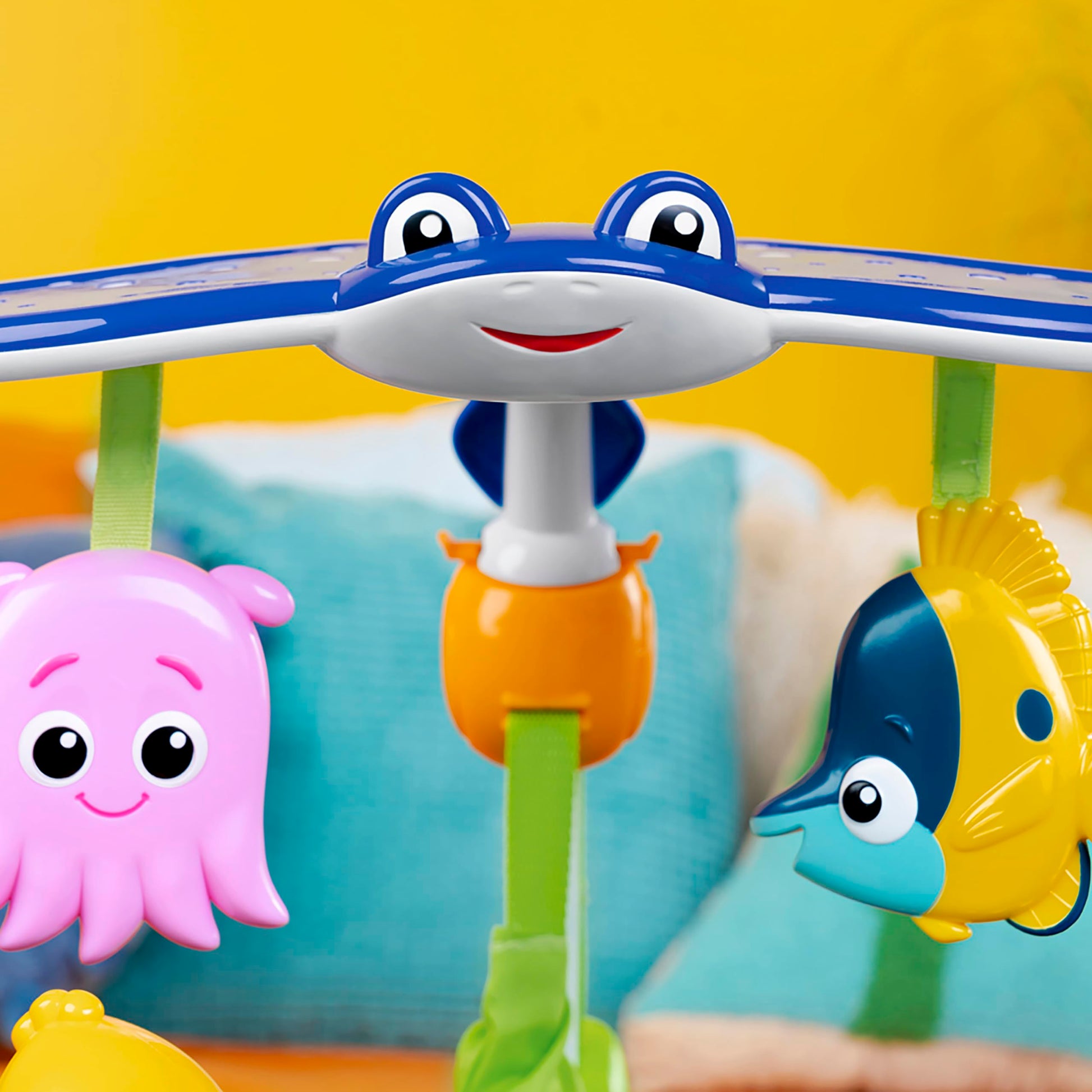 Bright Starts Disney Baby Finding Nemo Sea of Activities Jumper with 13 activities, lights, music, ocean sounds, and 360° rotation for babies.