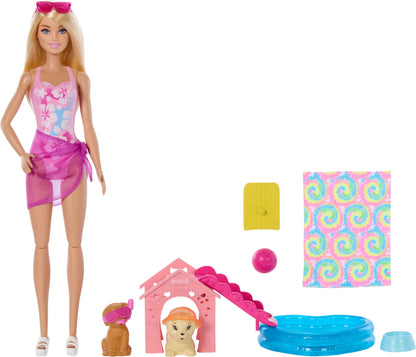 Barbie Puppy Pool Party toy playset with fashion doll, doghouse, slide, heart-shaped pool, two pet dogs, and accessories.