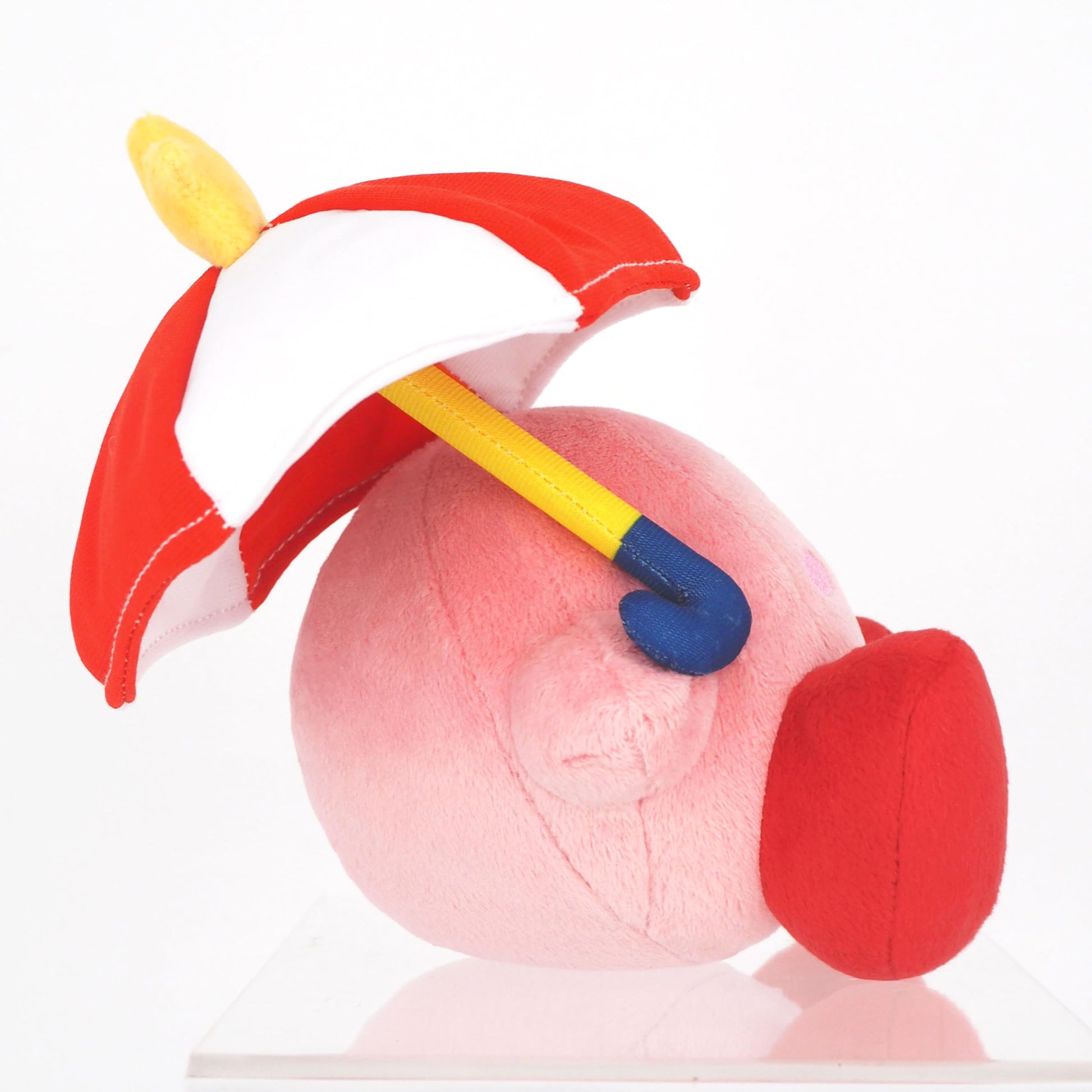 Nintendo Together+ Kirby plush toy featuring Kirby holding a parasol, 13 cm soft stuffed character from Together Plus.