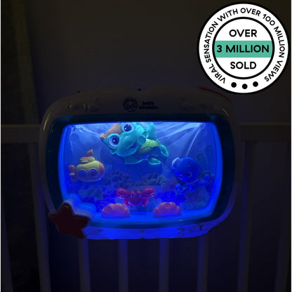 Baby Einstein Sea Dreams Soother crib toy with remote, calming lights, melodies, and sleep aid features for newborns and infants.
